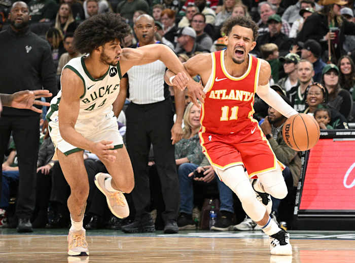 Atlanta Hawks guard Trae Young (11) drives to the basket against Milwaukee Bucks guard Andre Jackson Jr. (44) i